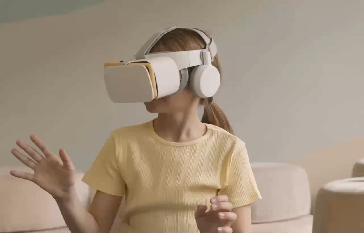 Child wearing a VR headset at home